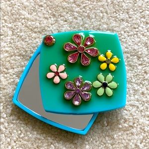 Teal compact mirror with flower gemstone design